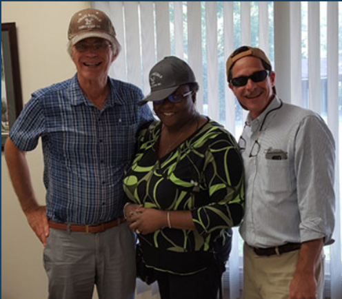 Norman, Gwen & Harry Having Fun With Vendors' Caps.